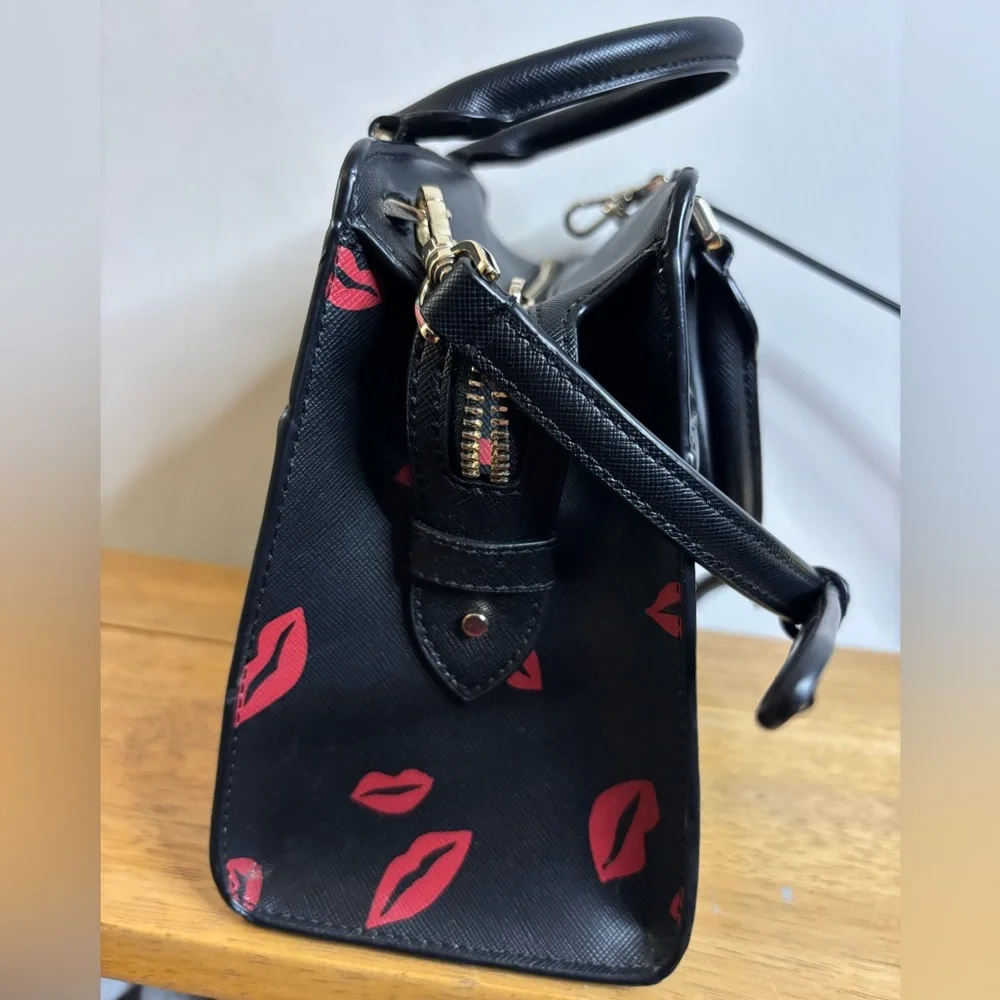 Kate Spade New York Madison Lip Toss small satchel in black saffiano leather
